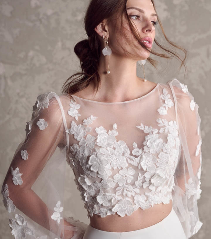 Model wearing a bridal white dress